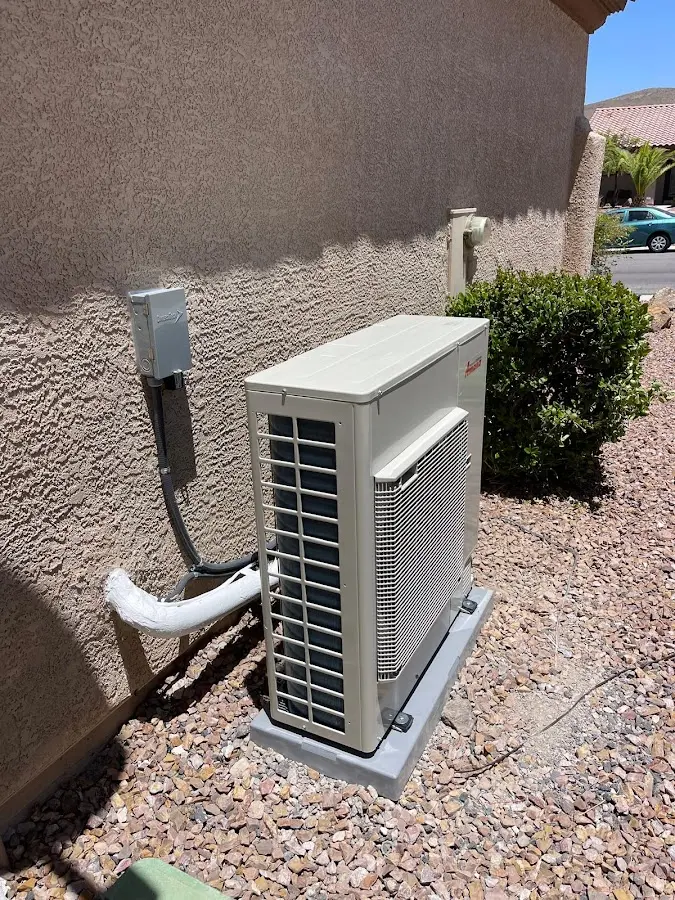 Residential air conditioning condenser unit in Minot